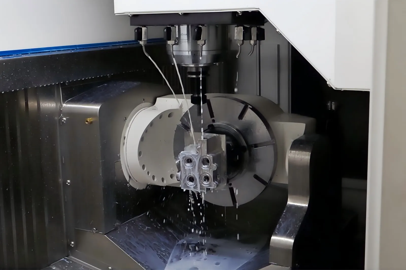 5-axis milling of a valve block on a trunnion table